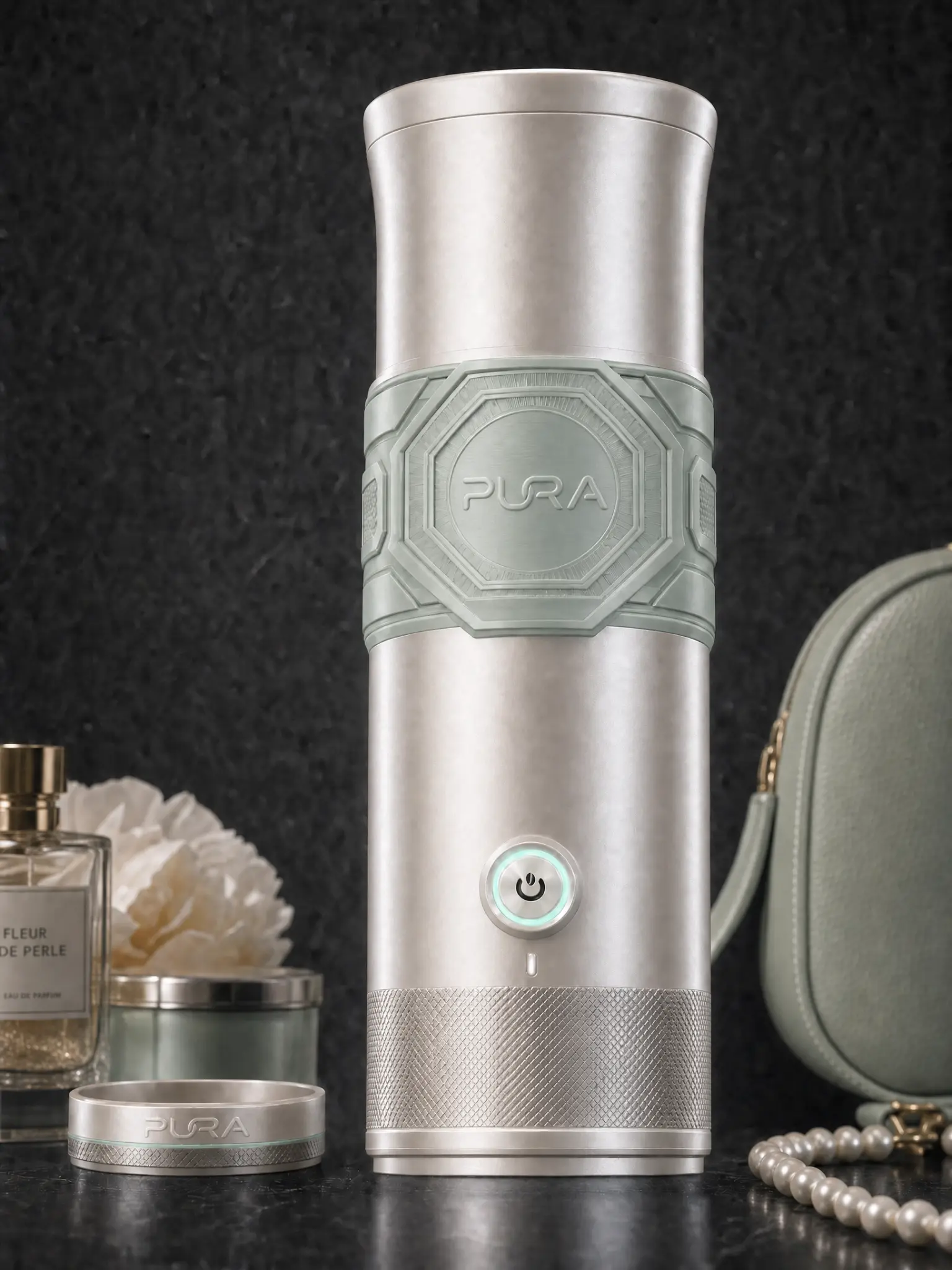 PURA K1 Metal PVD Edition in Pearl Mint Couture silver finish with mint silicone grip styled with perfume and clutch